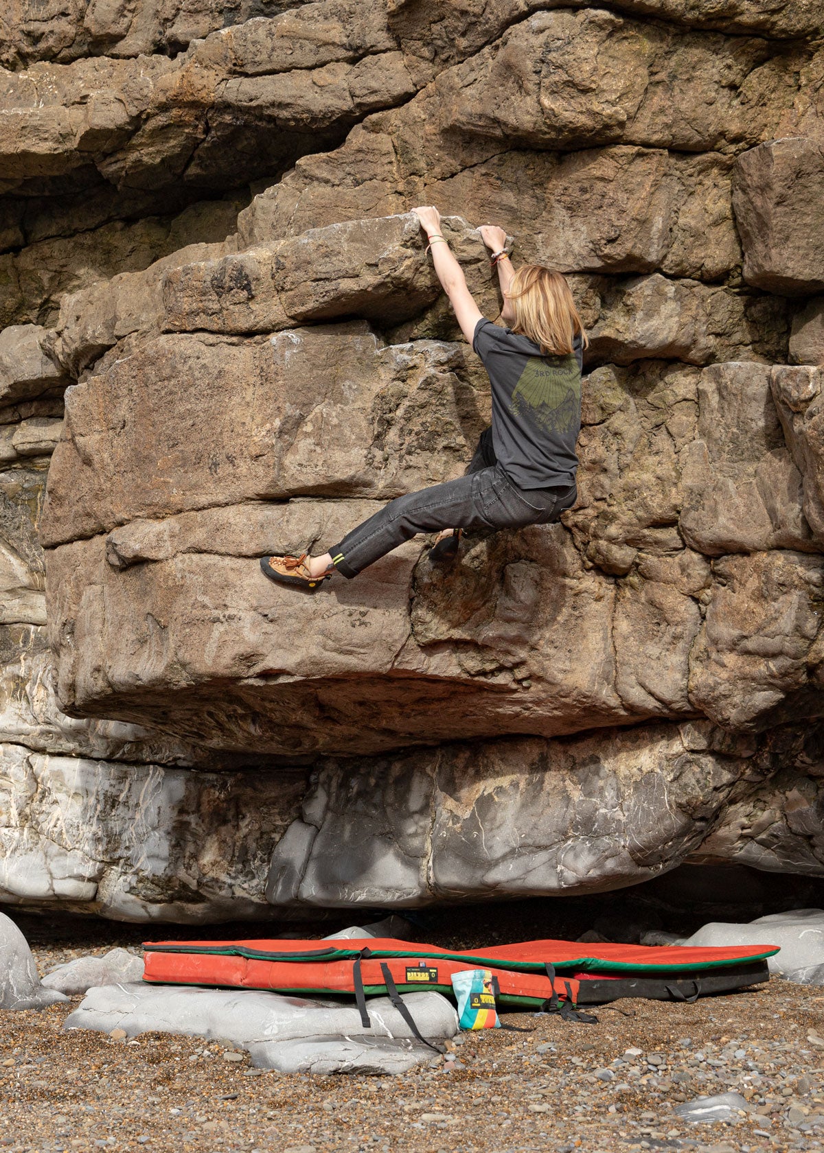 Becky rocking the Mars when bouldering in South wales. F