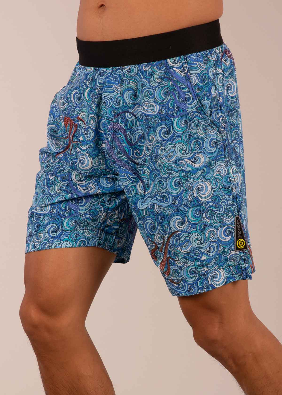 3RD ROCK sustainable recycled summer shorts - Donald is 6ft 1″ with a 30" waist and is wearing a size 30. Pattern: Octowave.