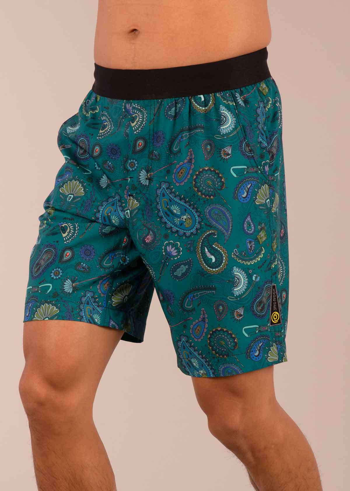 3RD ROCK sustainable multi-purpose shorts - Donald is 6ft 1″ with a 30" waist and is wearing a size 30. Pattern: Paisley Teal.