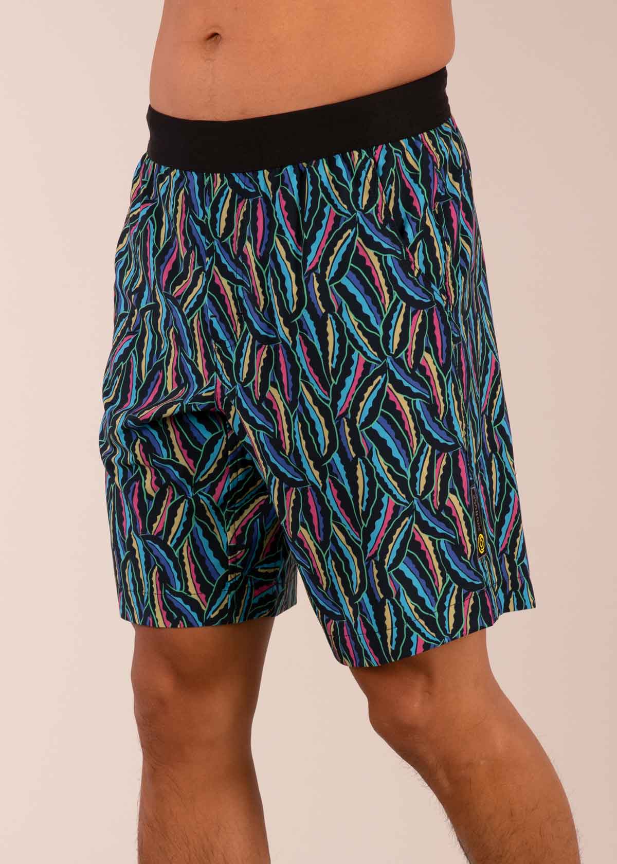 3RD ROCK sustainable climbing and swim shorts - Donald is 6ft 1″ with a 30" waist and is wearing a size 30. Pattern: Tuti Shrubbery.