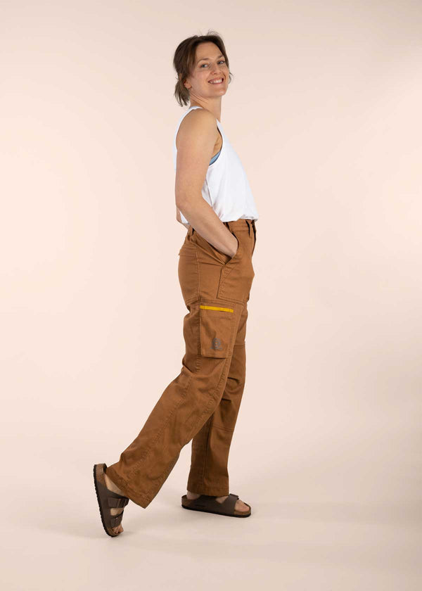 3RD ROCK sustainable brown khaki cargo trousers - Jess is 5ft 8” with a  29" waist, 38" hips & a 32.5" inseam and is wearing a size 28RL.