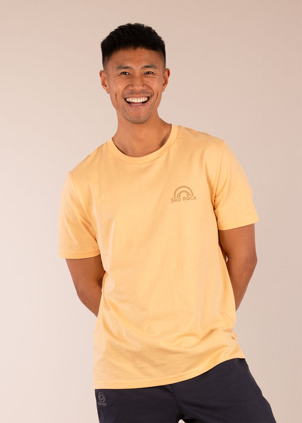 3RD ROCK Clothing organic cotton tee with horizon logo in our egg custard colour - Donald is 6ft1″  with a 40" chest and is wearing a size L.